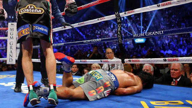 VICIOUS. Pacquiao suffered the worst KO of his career against Marquez. File photo by AFP.