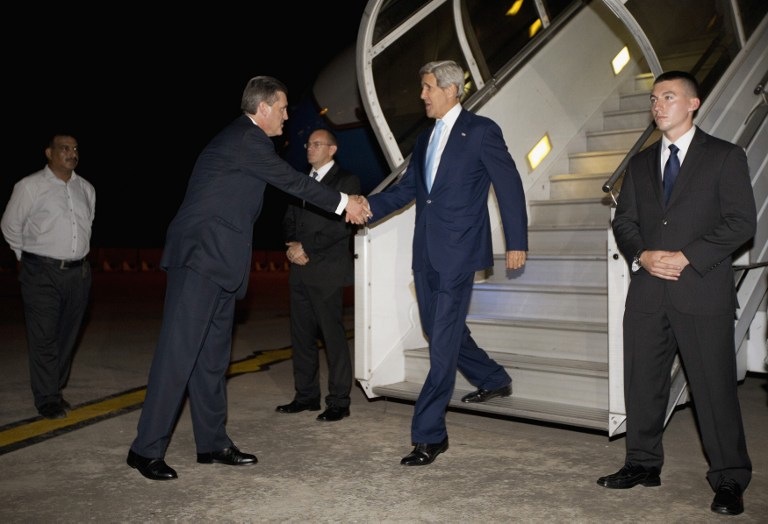 KERRY ABROAD. US Secretary of State John Kerry(R) is greeted by US Ambassador to Pakistan Richard Olson (2nd L) upon his arrival in Islamabad, Pakistan, July 31, 2013. Photo by AFP/Pool/Jason Reed