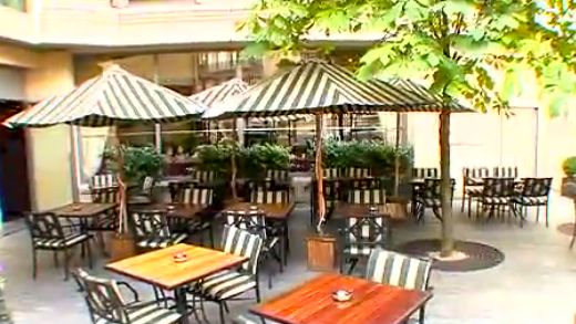 AN AL FRESCO PART of the Hilton Hotel Arc de Triomphe in Paris, France. Screen grab from YouTube