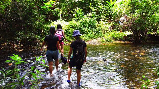 STREAM CROSSING. Dry bags are perfect for trips like this