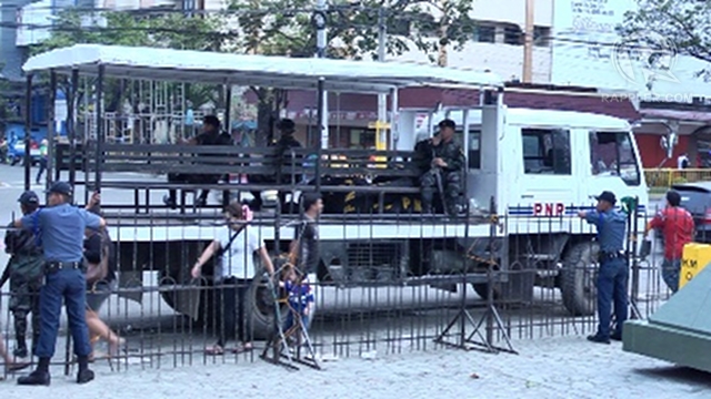 SECURITY VS 'GARRISON STATE.' Cebu Rep Pablo John Garcia said the police presence in Cebu is indicative of a "garrison state" imposed by his sister's critics. Yet police said the deployment is just meant to secure the capitol. 