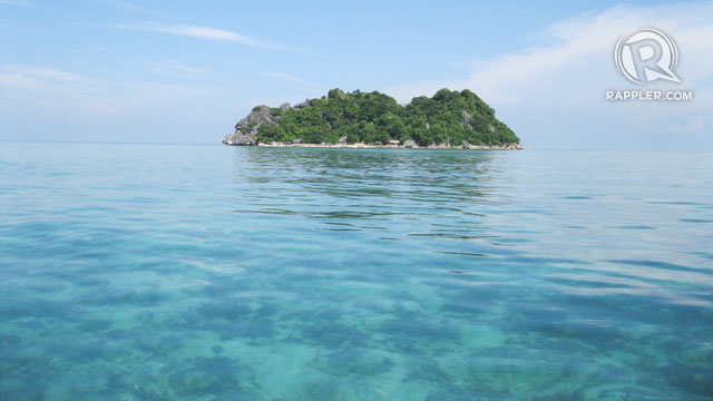 BLUER THAN BLUE. One of Islas de Gigantes’ pristine islands. Photo by Kat Torres