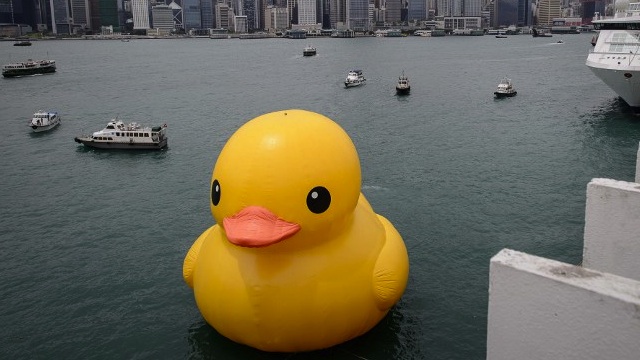 'RUBBER DUCKIE, YOU'RE THE ONE' The 16.5-meter-tall inflatable Rubber Duck art installation seen at the Victoria Harbour in Hong Kong last May 2 will have a permanent version in Taiwan, still by Dutch artist Florentijn Hofman. AFP PHOTO/Philippe Lopez