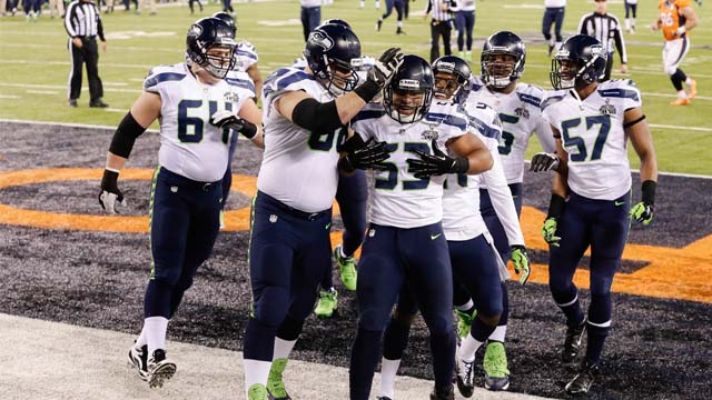 The Seattle Seahawks celebrate one of many touchdowns in Super Bowl XLVIII, where they defeated the Denver Broncos. Photo by Jason Szenes/EPA