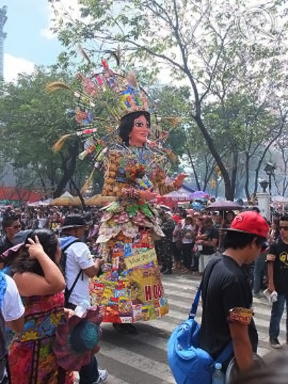 THE LADY. Reyna Juana in the form of a "higante" bears an image of the Santo Nino in her arms, a gift from Ferdinand Magellan after her baptism into the Catholic faith