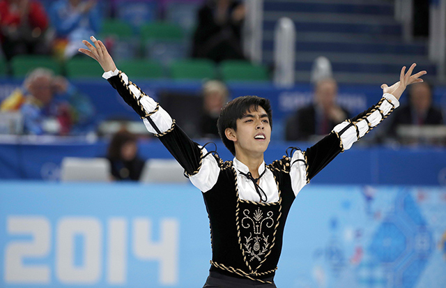 MIRACLE ON ICE. Lone Filipino Winter Olympian Michael Christian Martinez takes in the crowd's applause after a stunning performance on Thursday night. Photo by EPA