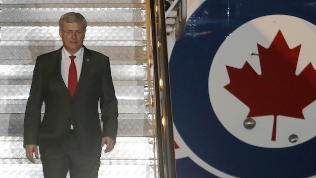 WARNING. Canadian Prime Minister Stephen Harper threatened he may join Washington in snubbing June's G8 summit in Russia over the country's military incursion into Ukraine. EPA/Made Nagi