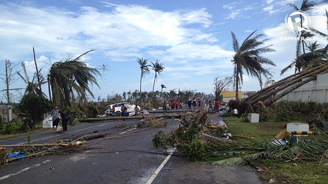 DEVASTATION. Super Typhoon Yolanda knocked off power and communication lines in Tacloban. Photo by Rupert Ambil/Rappler