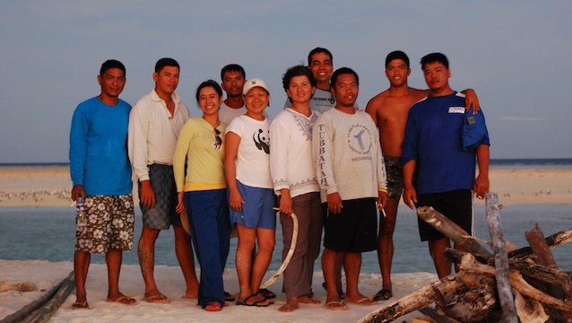PARK RANGERS. Angelique Songco (center) with her staff at the Tubbataha Reefs Natural Park. Photo courtesy of Angelique Songco