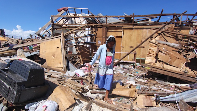 HIDING IN THE LOO. Many residents survived after taking shelter inside concrete restrooms. Photo by Karlos Manlupig