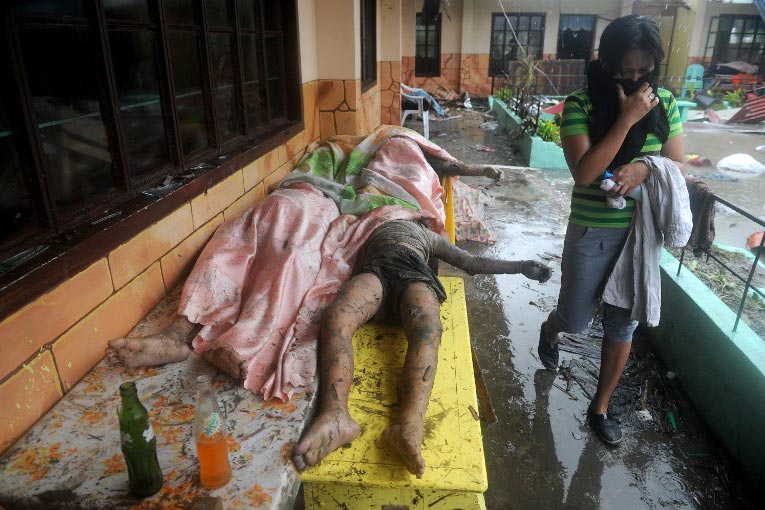 PILE OF BODIES. Dead bodies inside the Fisherman's Village Elementary School, an evacuation center in Tacloban City before typhoon Yolanda/Haiyan. Photo by AFP/Noel Celis