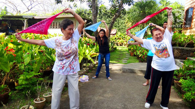 83-year-old Julie Saprid, Dr. Day?s mother, leads guests through an exercise routine