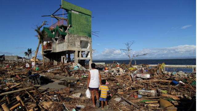 DIFFICULT LIVES. Super Typhoon Yolanda (Haiyan) destroys this coastal barangay in Tacloban City, Leyte. Photo by Vincent Go