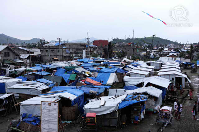 HOMELESS SURVIVORS. Up to 130,000 Yolanda (Haiyan) survivors still live in tents as of April 2014, the government says. File photo by Franz Lopez/Rappler