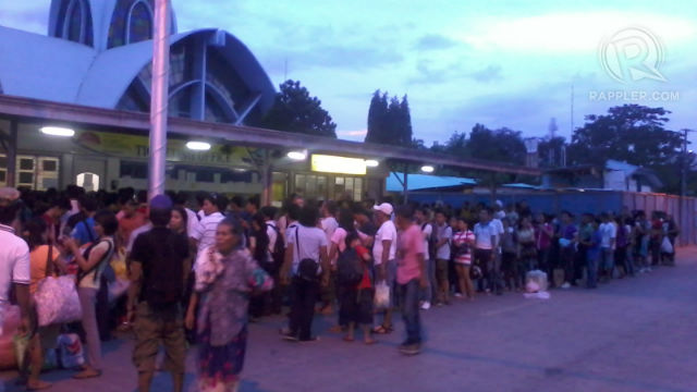 LONG LINES. At least a thousand passengers are outside the Cebu Port waiting for their ride home. Photo by James Salomon