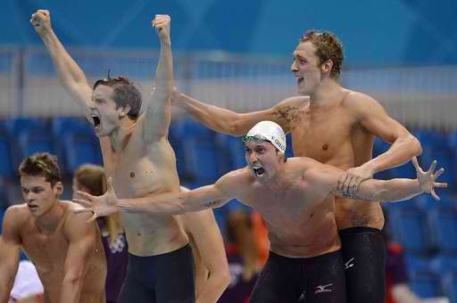 Swimming: France stuns USA, Phelps on verge of history