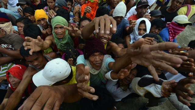 PABLO'S VICTIMS. Typhoon Pablo devastated up to 2.3-M voters in affected provinces. AFP Photo/Ted Aljibe