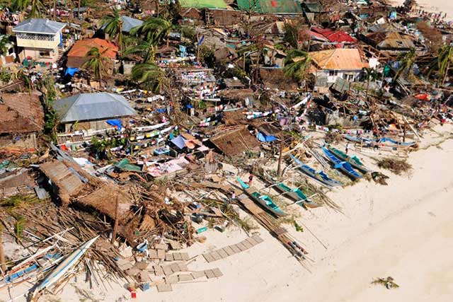 SEVERELY HIT. The coastline in Iloilo after typhoon Yolanda/Haiyan hit the province. Photo by AFP/Raul Banias